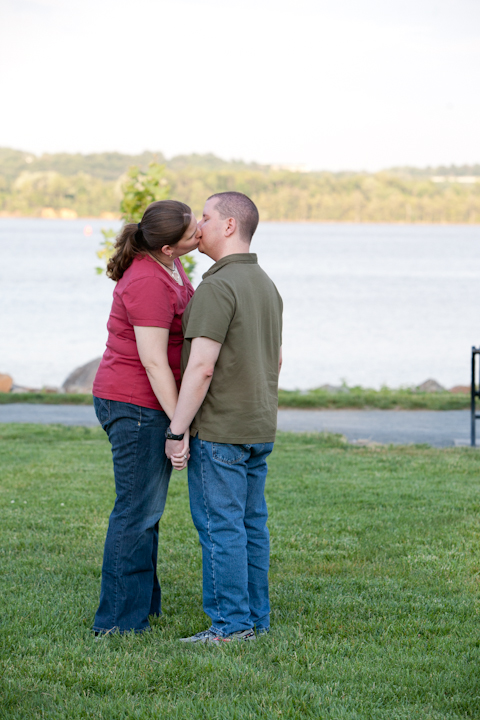 Cammie & Nick kissing in the park